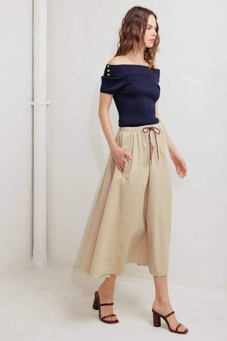 A solid woven midi skirt