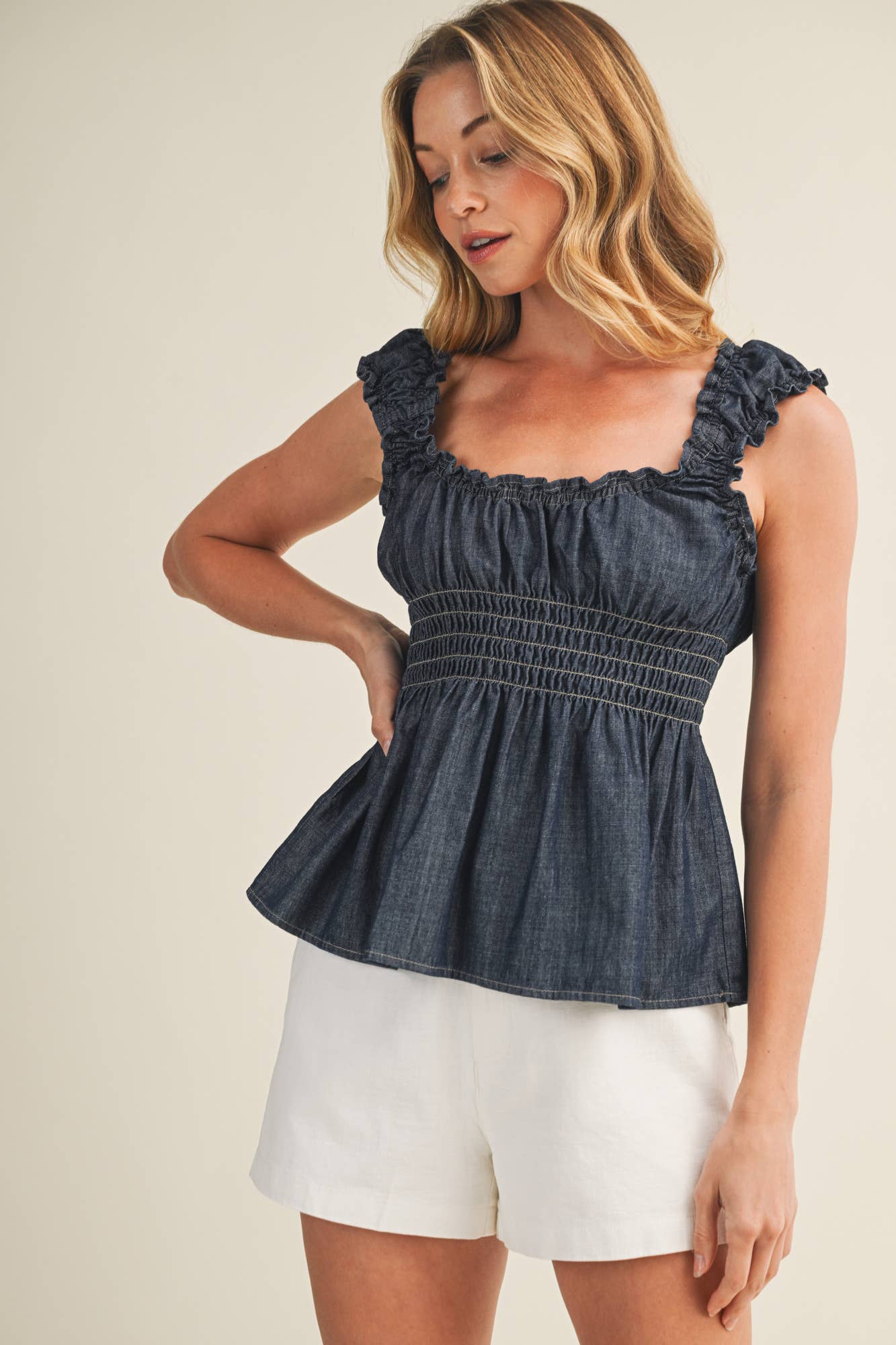 SLEEVELESS WAIST SMOCKED PEPLUM DENIM TOP