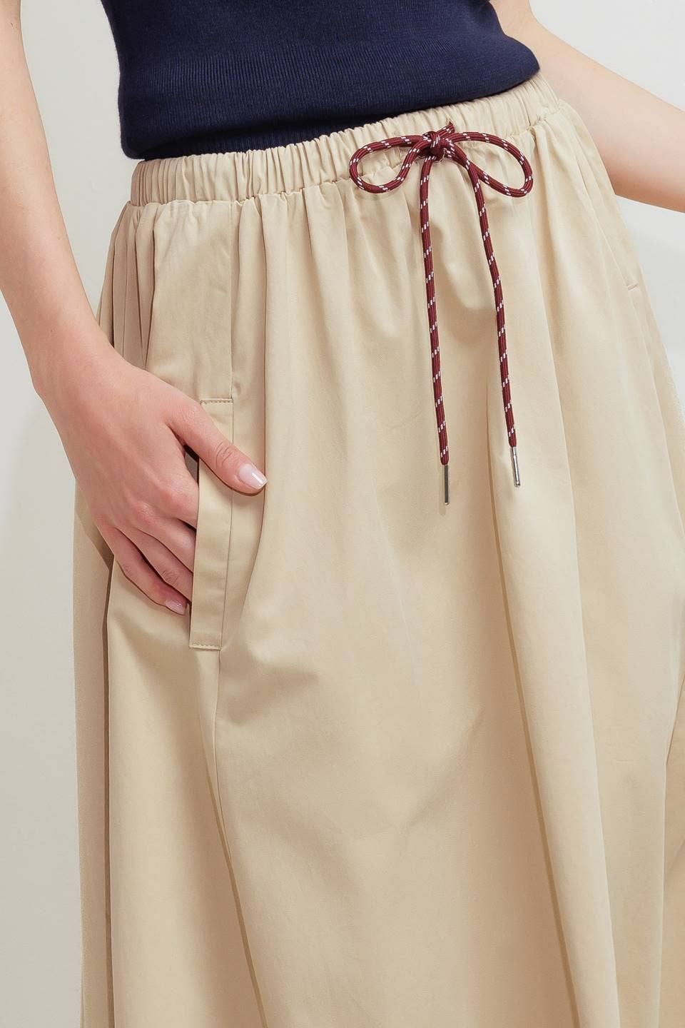 A solid woven midi skirt