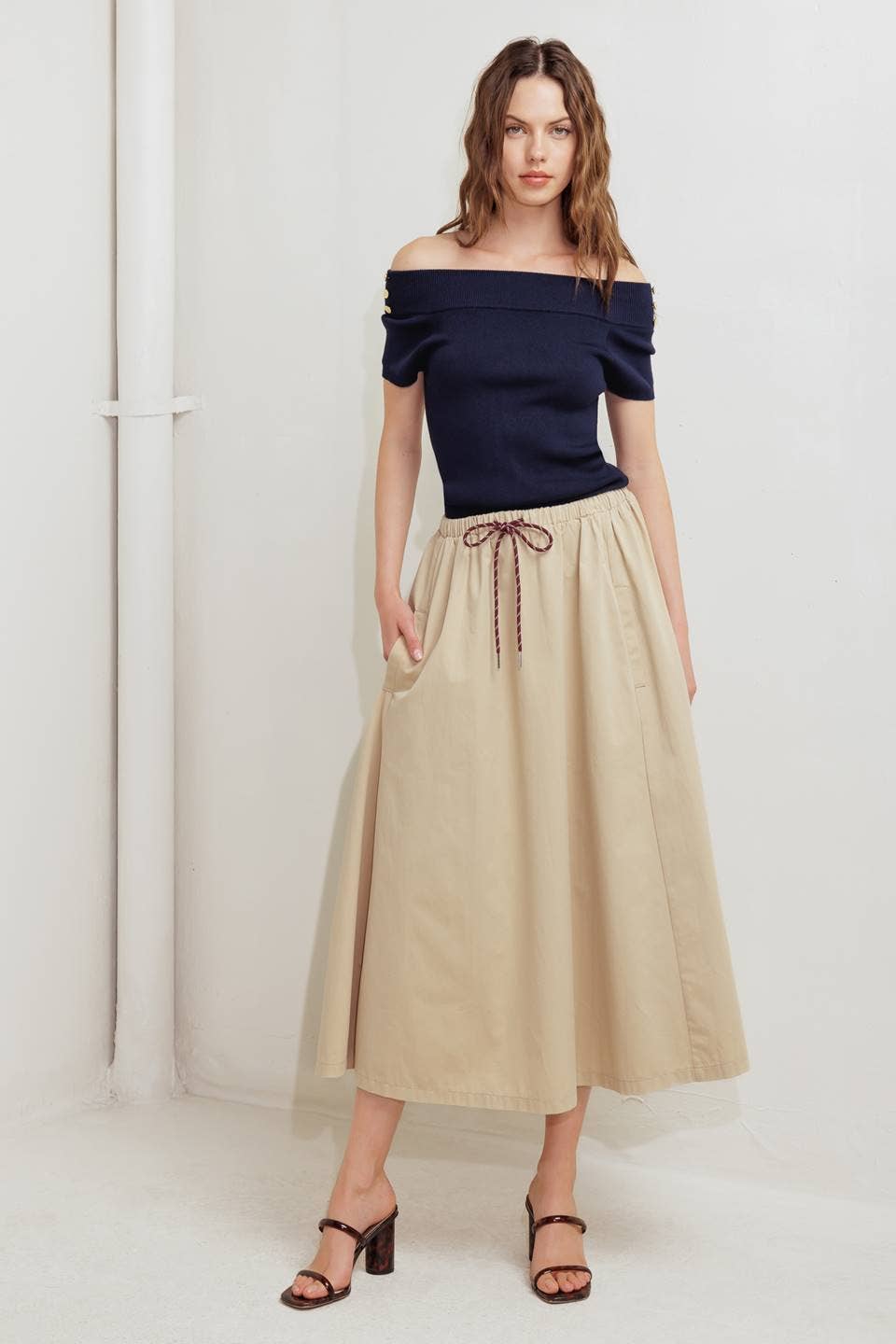 A solid woven midi skirt