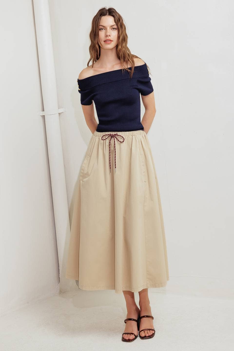 A solid woven midi skirt