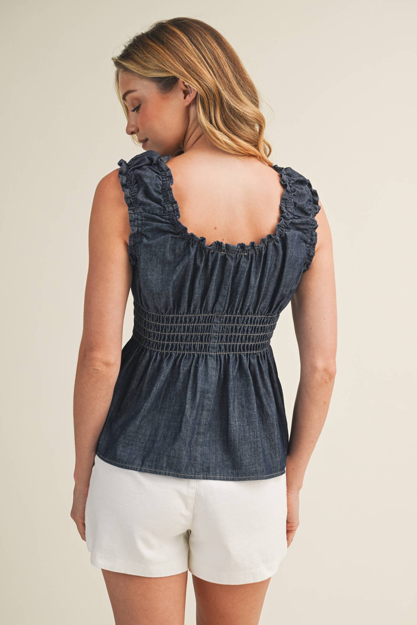 SLEEVELESS WAIST SMOCKED PEPLUM DENIM TOP